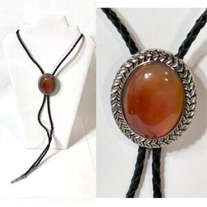 Amber-tone, silver-tone and black cord western cowboy bolo tie